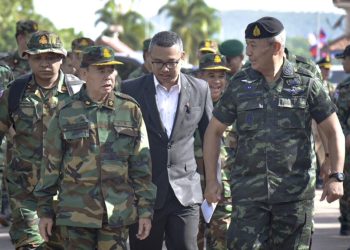 FILE - In this photo released by the Thai Royal Thai Army, Cambodian Chief of Army Mao Sophan, left, meets with Thailand Chief of Army Gen. Pana Claewplodtook, right, at a border checkpoint in Surin province, Thailand, May 29, 2025. (Thai Royal Thai Army via AP, file)